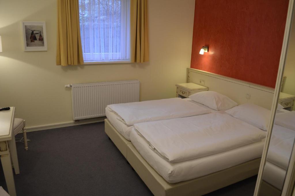 Hotel Pension Bellevue Bad Doberan Quarto foto